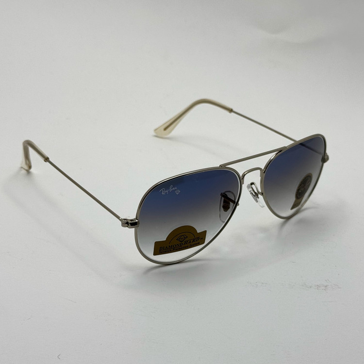 عینک ریبن خلبانی شیشه سنگ آبی هایلایت فریم نقره ای به همراه پک کامل ریبن Rayban RB 3025