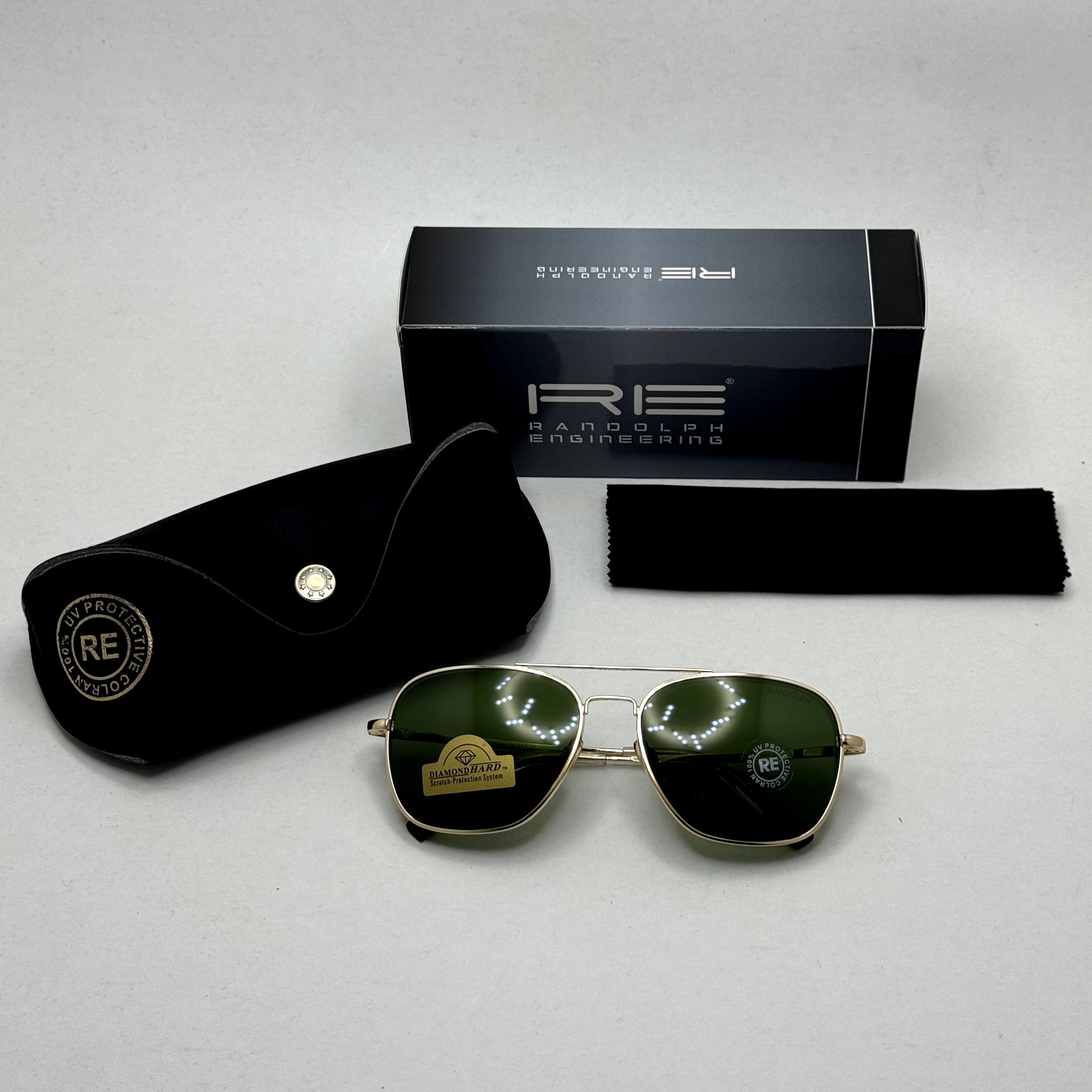 عینک آفتابی خلبانی رندولف شیشه سنگ آنتی رفلکس سبز فریم طلایی فول پک اصلی RANDOLPH AVIATOR RE 58 24K GOLD