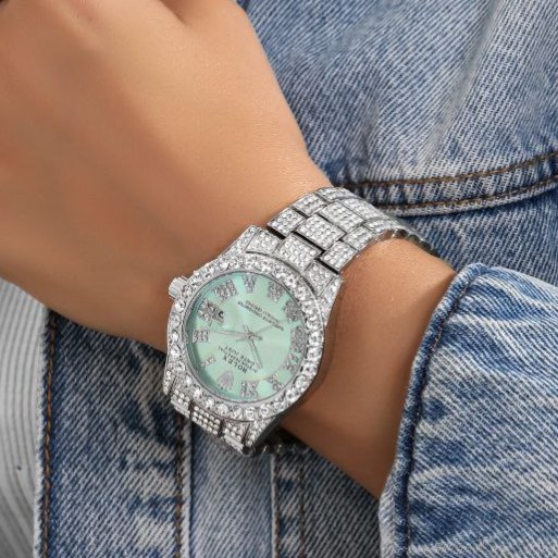 ساعت مچی زنانه طرح رولکس Rolex قفل پروانه ای فول نگین کار شده سیلور تقویم دار رنگ ثابت کد zmp (پس کرایه)