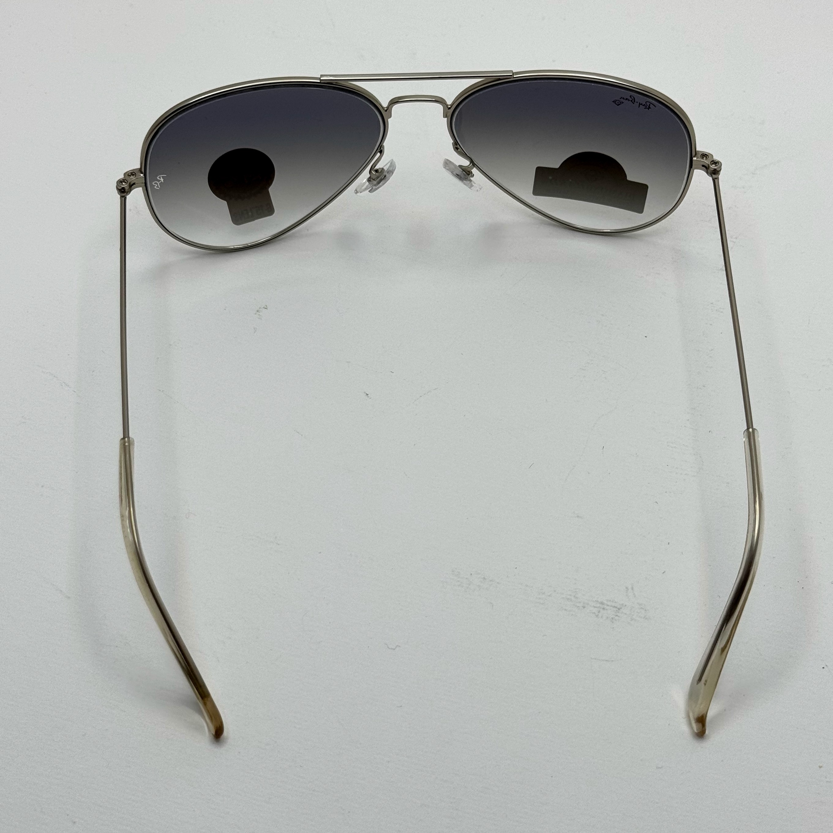 عینک ریبن خلبانی شیشه سنگ آبی هایلایت فریم نقره ای به همراه پک کامل ریبن Rayban RB 3025 (ارسال رایگان)